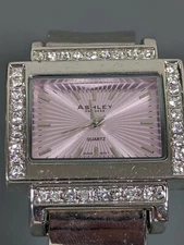 Ashley Pink Dial Crystal Accent Silver Tone Hinge Bangle Band Watch