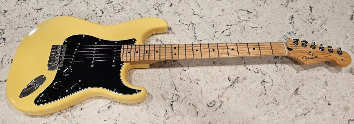 Pastel shop yellow guitar