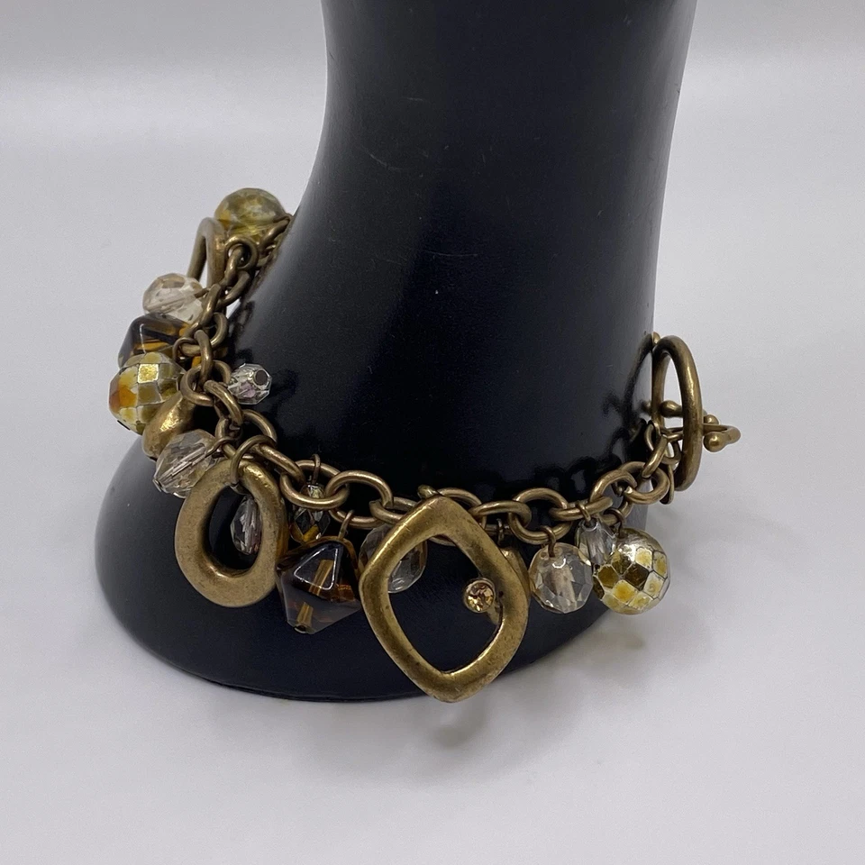 Brazalete moderno firmado Chico’s marrón estrás tono bronce geométrico con dije Foto 3 de 4