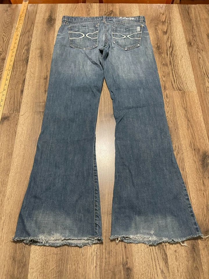 Jeans Lux, para mujer talla 30, azul, denim, pierna ancha, dobladillo deshilachado, bolsillos Foto 2 de 4