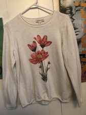white flower sweater