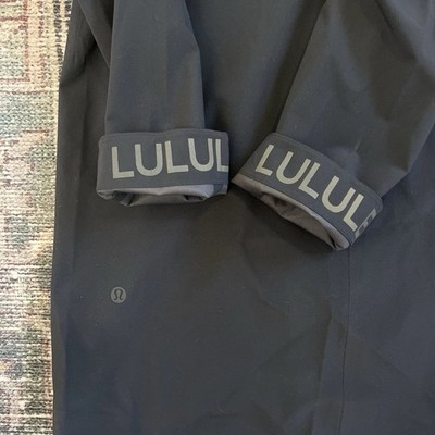 Lululemon Rain Rebel Stretch Jacket. Mid-length, zip and button closure w/hood.