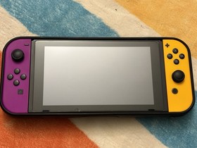 Nintendo Switch Bundle,Orange & Purple Console, Case,Power Cord, Dock & Micro SD