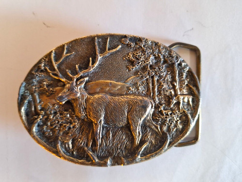 Belt buckle bronze hand carved by Paula Freed Ultra Ent. inc. Denver CO