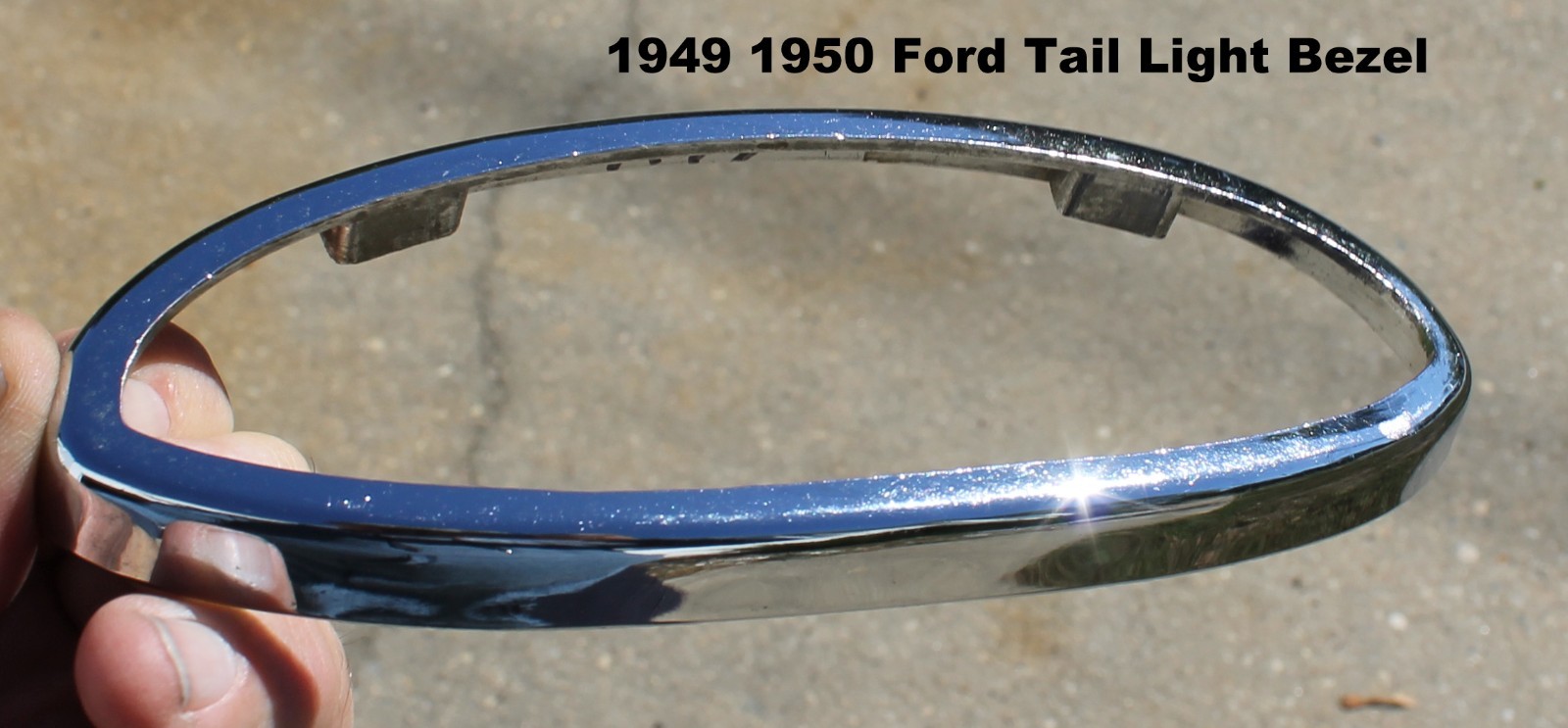 One 1949 - 1950 Ford Chrome Tail Light Bezel  (8A-13448)