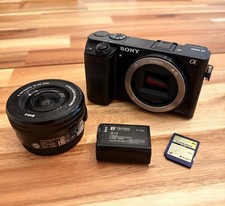 Imagen de Sony Alpha a6000 Mirrorless Digital Camera w/ 16-50mm OSS Lens, Battery, and SD