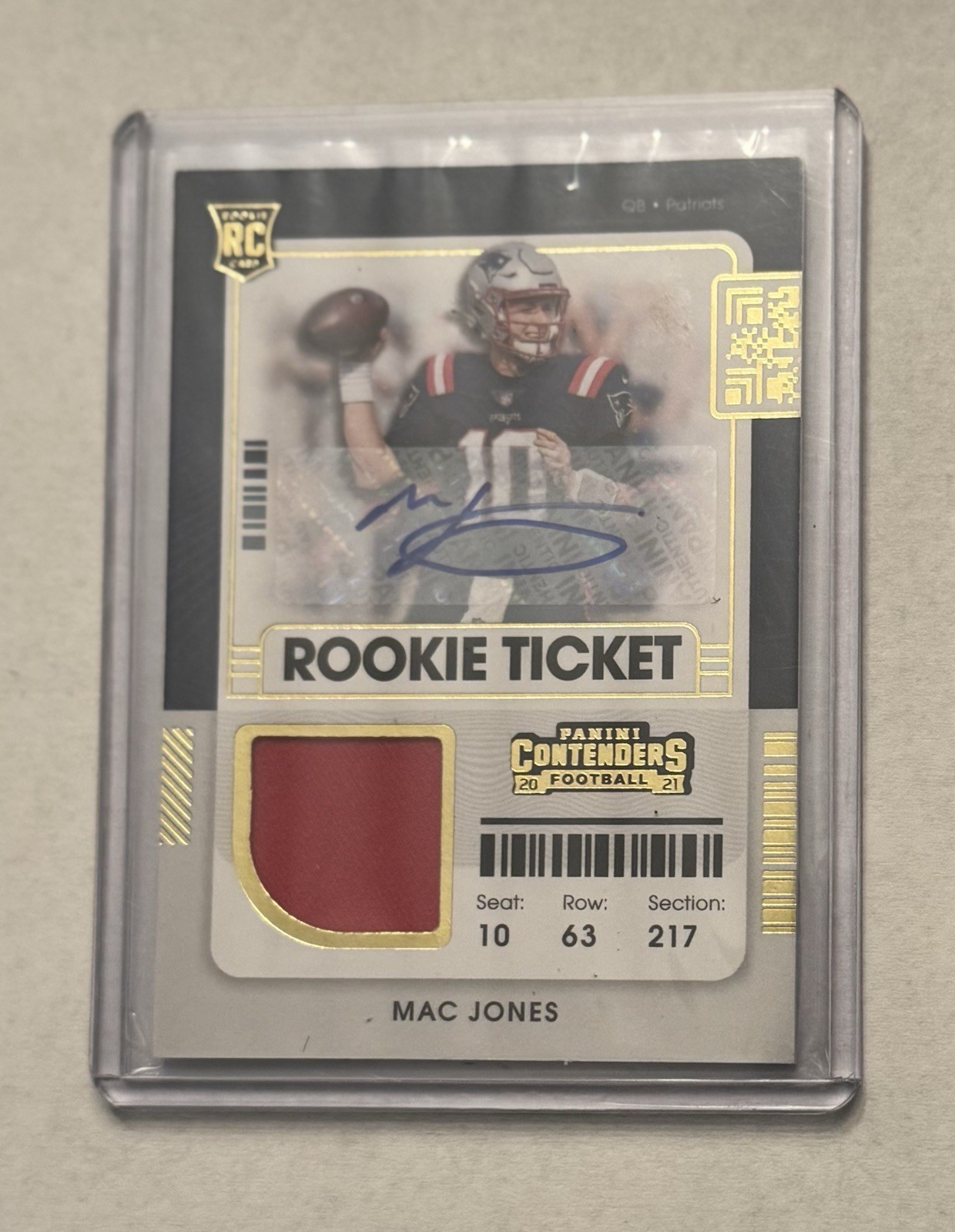 Mac Jones Panini Contenders Rookie Ticket Swatches #MJO Autograph-Variation