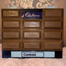 Vintage Cadbury chocolate Sign Plastic chunks of CDM on wood backing with signs
