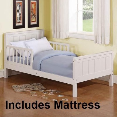 white wooden toddler bed