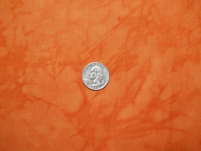 RJR FABRICS WITH AN ORANGE MARBLE  BTY