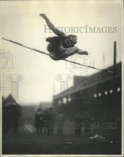 1928 Press Photo A. Plansky clears Bar in high jump at Georgetown Univ.