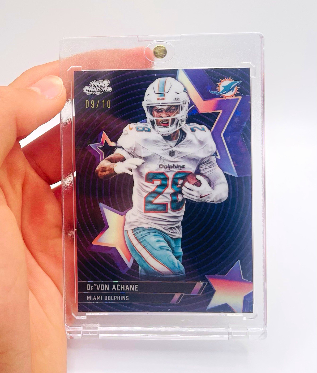 De'Von Achane #SF-33 (Football Cards 2025 Topps Cosmic Chrome StarFractor) — is it worth grading?