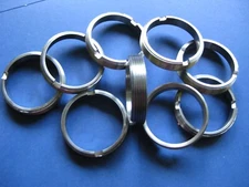 SPANNER NUT FOR RETAINING THE FIXED BEARING IN A DELTA UNISAW ARBOR CASTING.