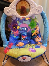 Fisher-Price Infant Baby Bouncer Seat w/ Toy Bar, Vibration, Blue/Multicolor
