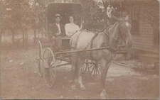 RPPC Postcard Man Woman Riding in Horse and Buggy Carriage 