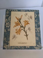 Photo album New, 8"x 9" holds 200 photos. Slip-in pockets. Lily design on cover.