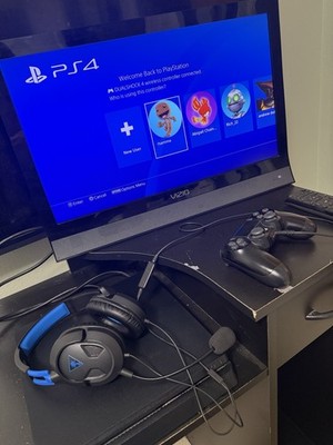 Sony PlayStation 4 Slim, Vizio Monitor, And Games.