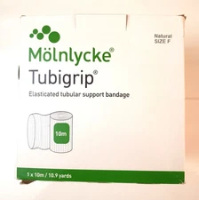 Molnlycke Tubigrip Size F 4" x 10M/10.9 yards Natural NEW Damaged Box