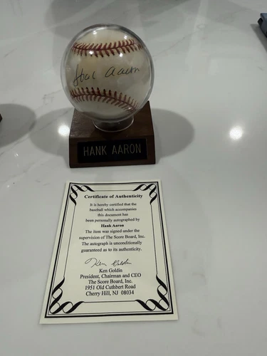 Hank Aaron autographed baseball with a Certificate of Authenticity (COA)