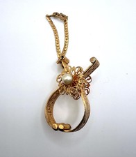 Vintage gold tone flower faux pearl embossed floral glove clip 1950s