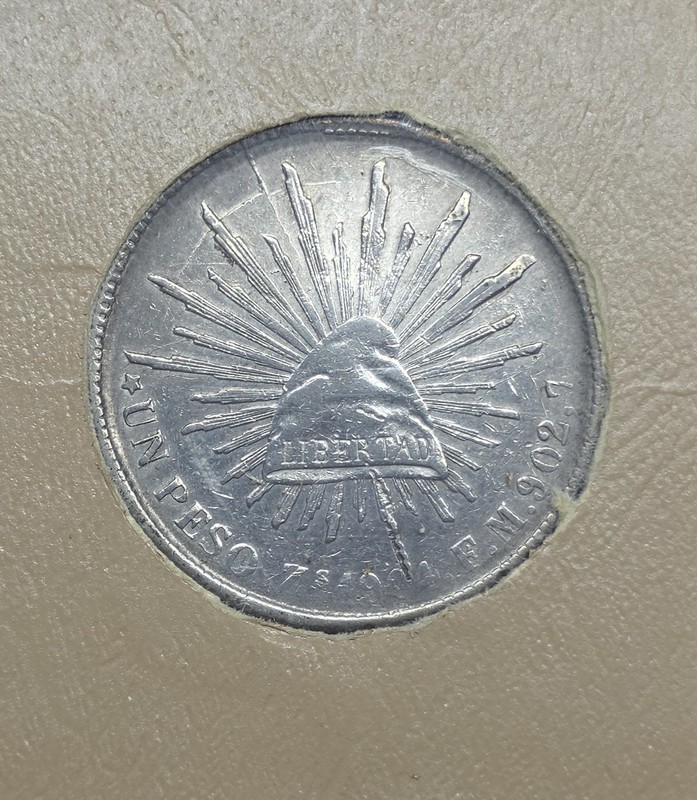 1904 Zs FM Silver Un Peso Cap and Rays Coin