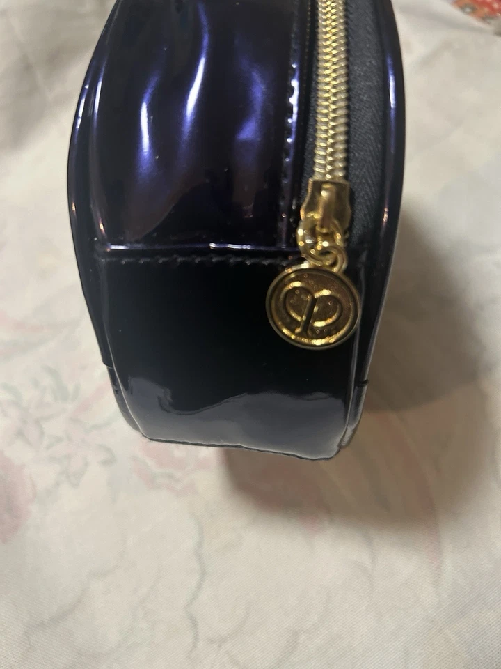Juego de belleza de lujo - Montale, Louboutin, Clé de Peau, brillo de pétalos Borghese + bolsa Foto 4 de 4