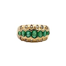 14k Yellow Gold Band Ring with (0.65ctw)Emerald and (0.24ctw)Diamond