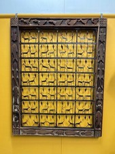 indian wood and wrought iron window panel