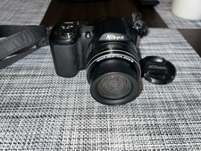 Nikon Coolpix L100 Digital Bridge Camera Blk 15x Optical, 10 Megapixel, 13 FPS
