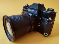 Spiegelreflexkamera Revue Revueflex 4000 EE mit Zubehör und Metz Stabblitz