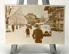 WW2 Era Photo U.S. GI Standing In Road Snow Filled Town