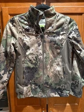 Magellan Outdoors Youth veil waterproof Elements Jacket in a camouflage pattern