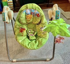Vintage Fisher Price Rainforest Swing. Works fine.