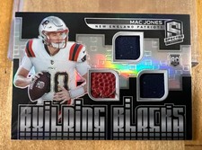 2021 Spectra Mac Jones Building Blocks Dual Jersey & Football Relic #/99 RC