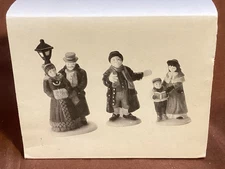 Department 56 Christmas Village Accessory Town Square Carole’s 5832-7