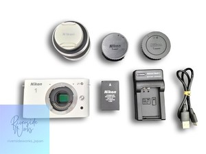 NIKON J1 10-30 Kamera - verschiedene Probleme, ideal für Ersatzteile