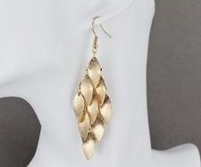 Gold chandelier earrings sparkly dangle pendant wiggly flowy 3.25" long