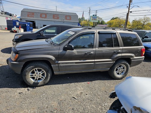 Used Right Headlight Assembly fits: 1999 Jeep Grand cherokee smoke tint dark bac - Picture 9 of 24