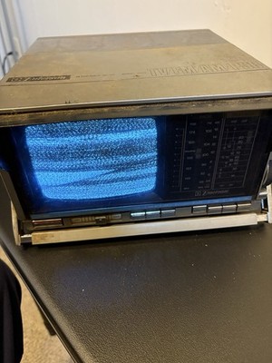 Vintage Emerson Emerson Model VR35 portable AC/DC television with built-in