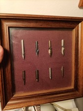 Bacheca con 8 pennini d'epoca anni 30'40'