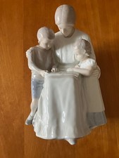 B&G Porcelain Figurine 1644 Mother with children reading a book. Denmark.