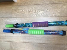 2 water sprayer toys. 68 cm length.