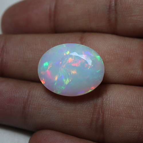 15 Carat 20.3x15.7 MM Natural AAAA Multi Flashy Fire Ethiopian White Opal Oval - Picture 6 of 8