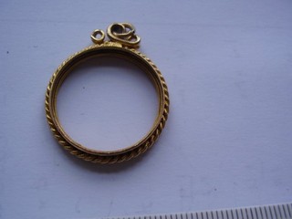 Antique 18K gold pendant will fit a Georgian spade guinea