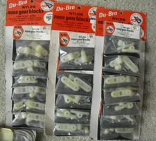 Lot of 18 Unopened Packs Vendor Display RC Parts Du Bro Nose Gear Block #125 NIP