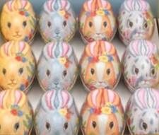 Easter Bunnies Tins 4 assorted 110 x 67 x 73mm shaped like easter bunnies