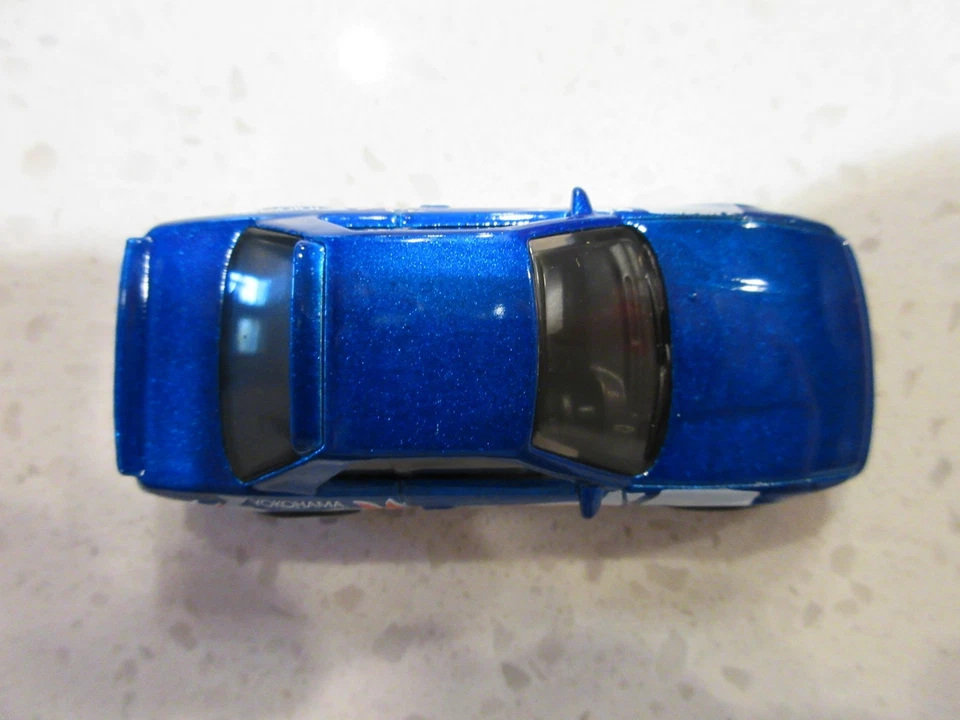 Coche de carreras de juguete Nissan Silvia (S13) 2025 Hot Wheels diseño exclusivo y color 1:64 Foto 3 de 4