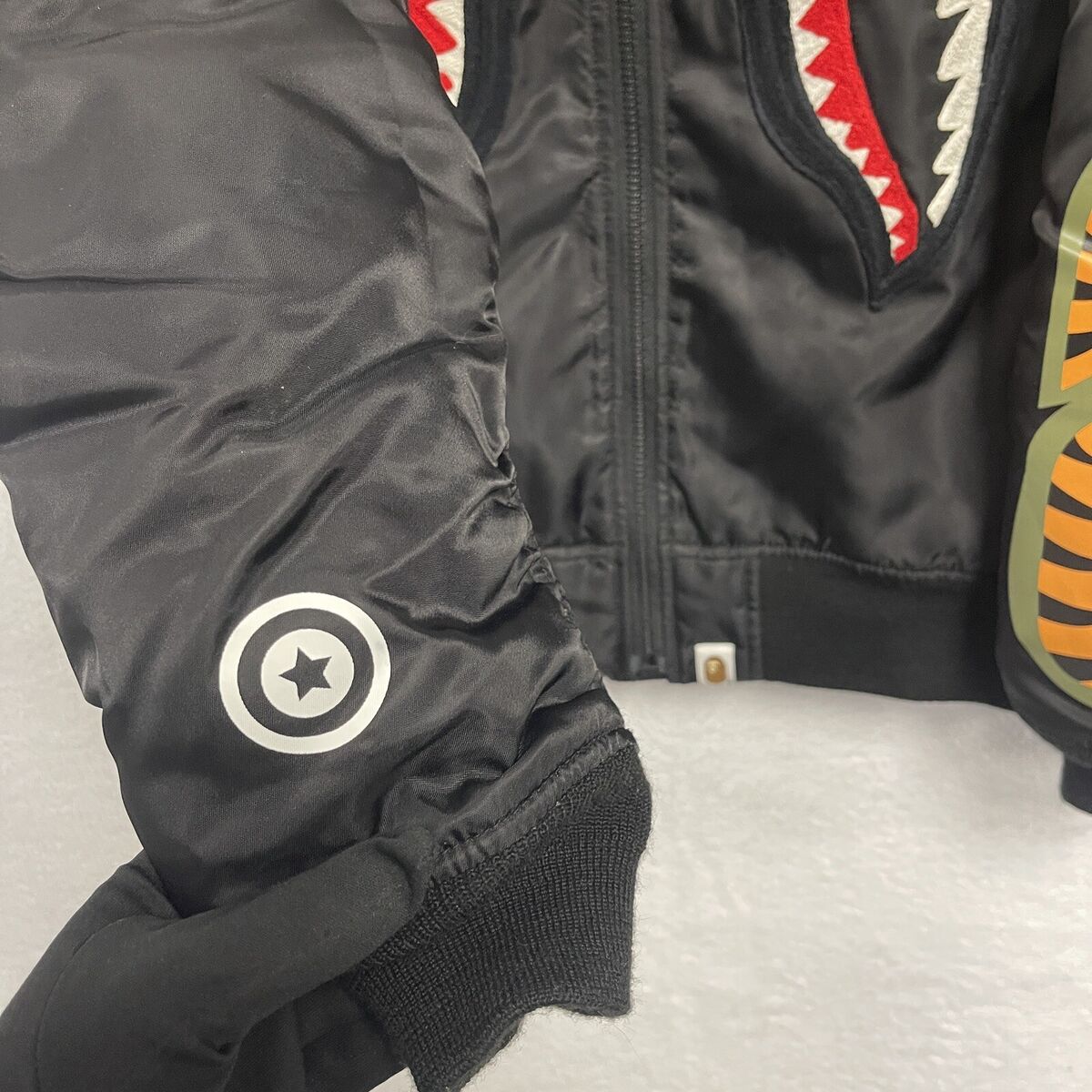 A Bathing Ape BAPE Nylon MA-1 Shark Embroidered Bomber A Bathing Ape BAPE Nylon MA-1 Shark Embroidered Bomber