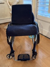 TiLite Manual Wheelchair Black Seat Yellow Spoke Wheels Detachable Footrests