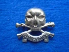 17TH/21ST LANCERS, DEATH OR GLORY SKULL & CROSS BONES METAL CAP BADGE, UK MADE.